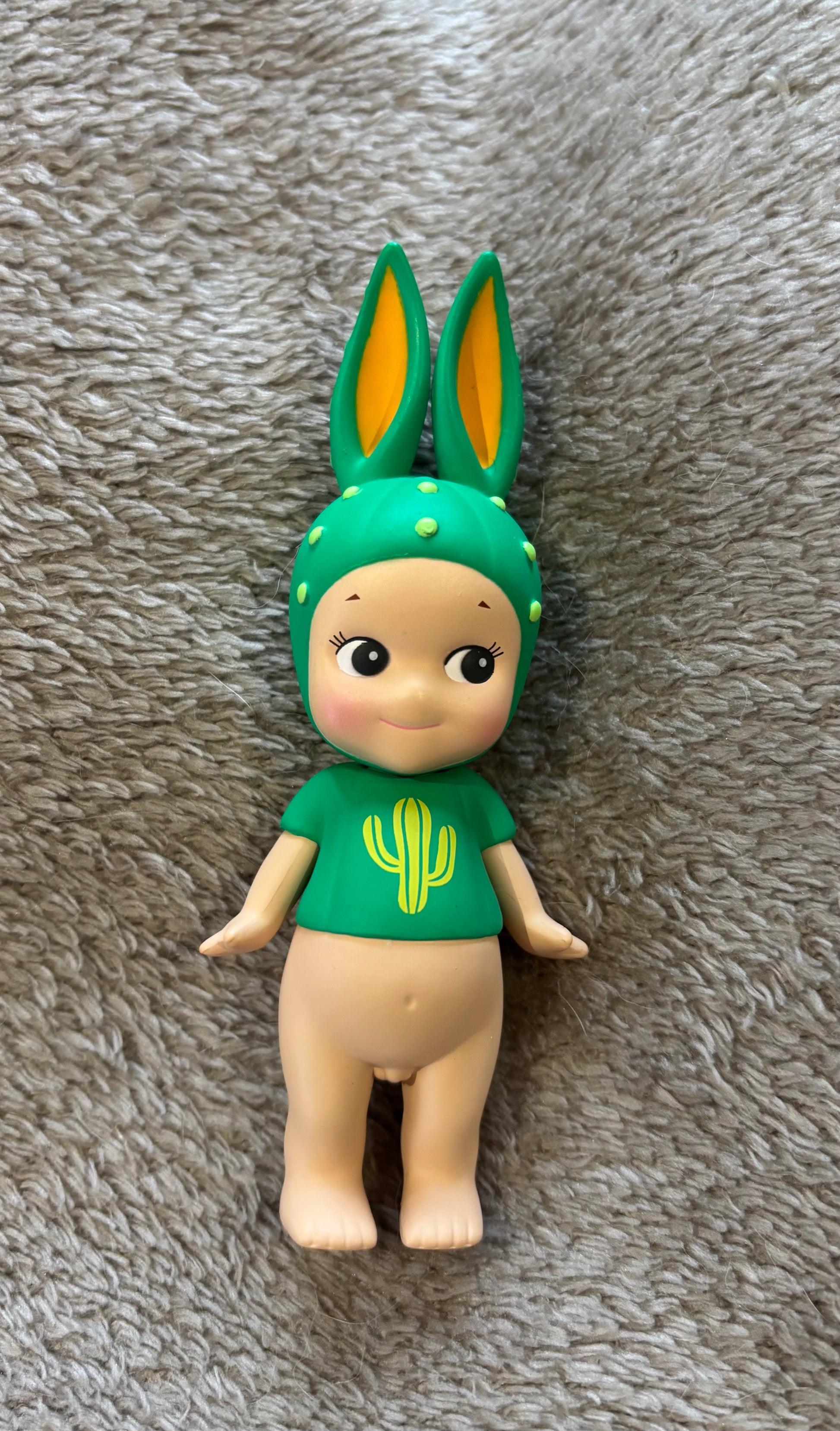 Cute Rabbit Cactus series Sonny Angel rare collectible mini figure green lying on grey blanket